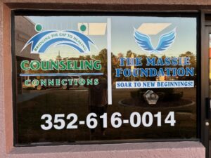 CCC and TMF front window of office